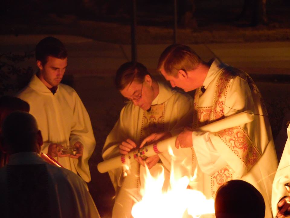 Clergy of St. Mary's Cathedral preparing the Easter candle during the Easter Vigil 2017