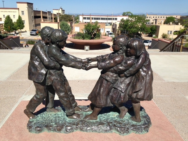 Statue of five children playing