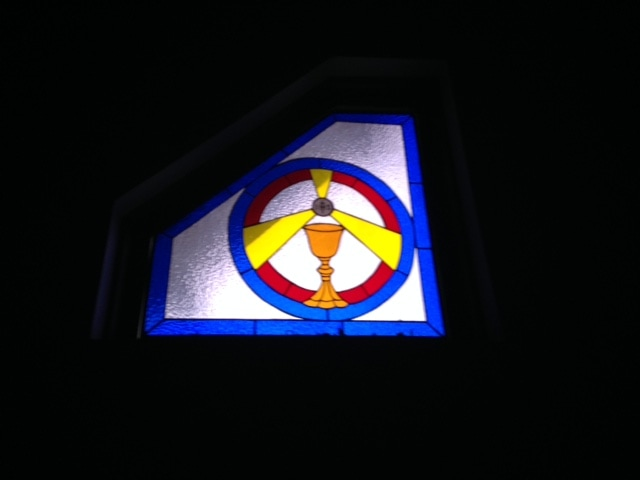 Stained glass window of the Eucharist